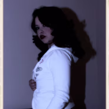 Angel Ann We were supposed to shoot outdoors but the the weather was horrible. So we hurredly put together this in-door shoot using all of Amanda's favorite 