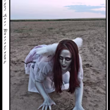 Dark Angel - Monica This was a test shoot we quickly put together. The strange thing was, we where in the middle of no-where, in an un-used field and we where thrown 